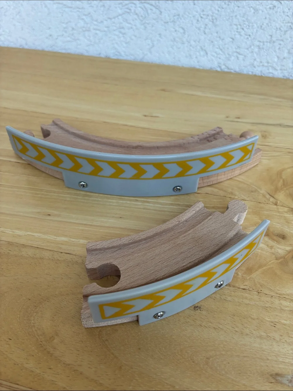 Wooden train tracks and light  Lot of 12 pieces. Great addition to your set!